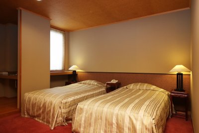 ｸﾞﾚｰﾄﾞｱｯﾌﾟ和洋室　 10畳和室+ツインの写真です。